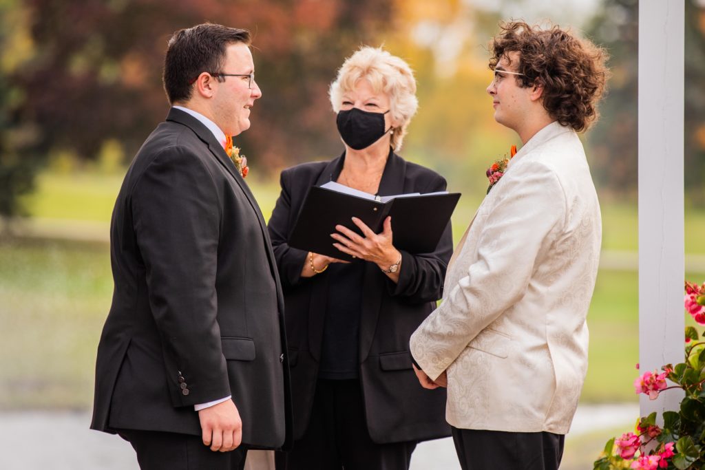 Masked officiant marries two grooms at Silver Lake Country Club