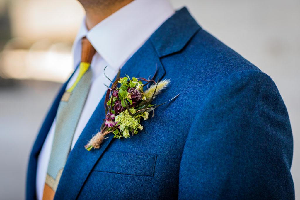 Close up of the groom's boutonnière 