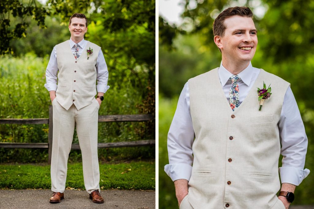 Groom smiling and posing with his hands in his pockets