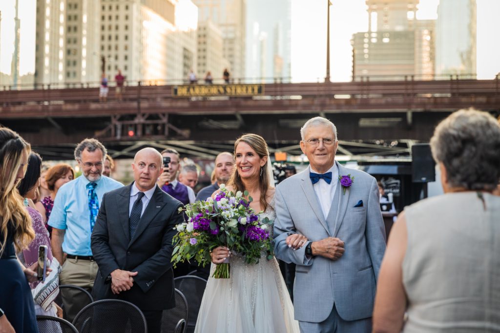 Bride walking down the aisle with her father on Chicago's First Lady Cruise
