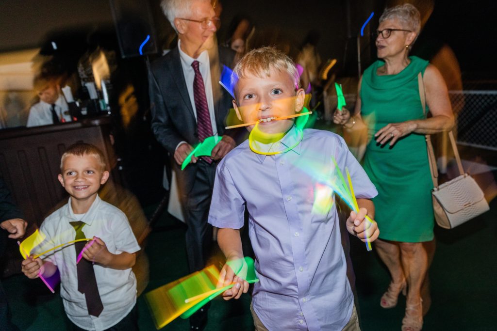 Bride's nephews dance with glow sticks