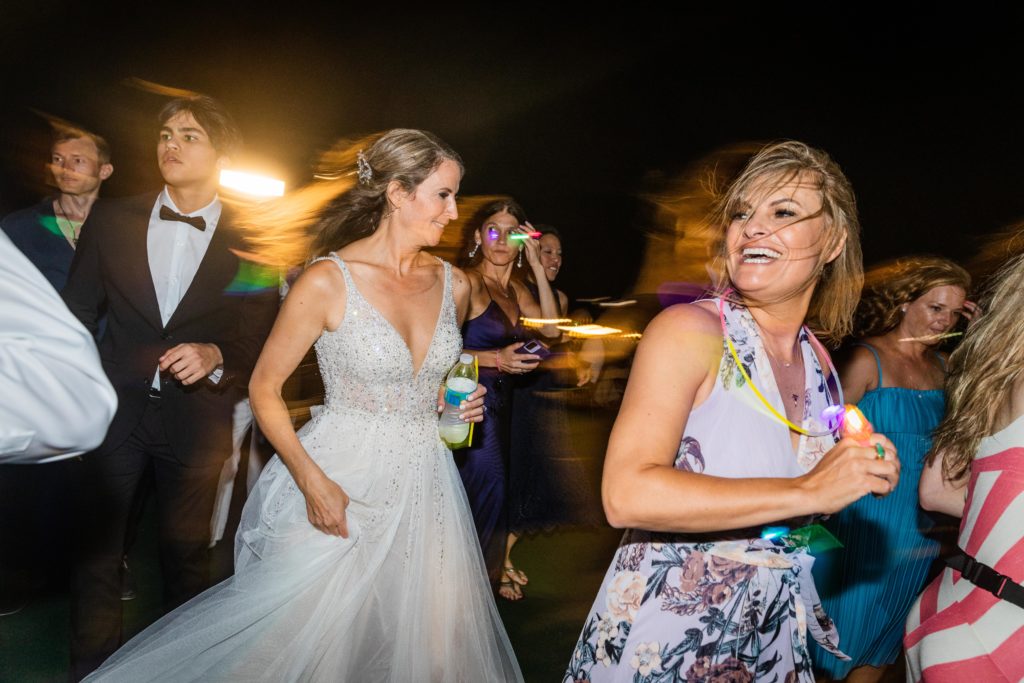 Bride dancing with her friend
