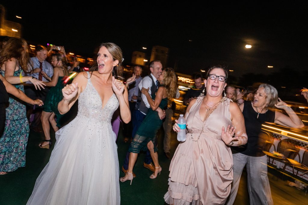 Bride dancing with her friends on Chicago's First Lady Cruise