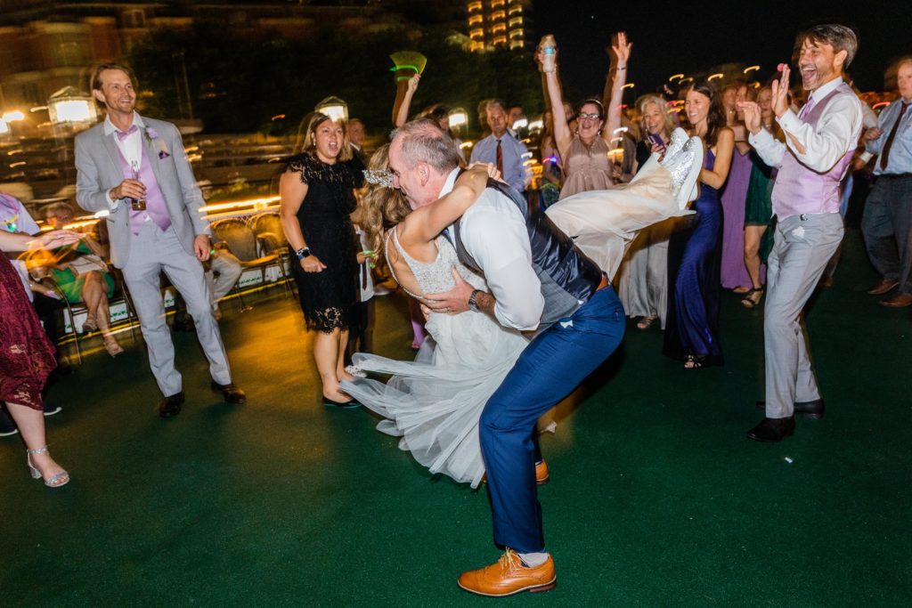 Bride being spun while dancing