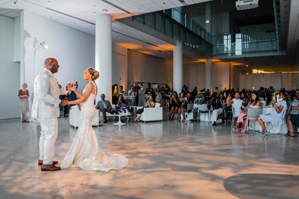 Bride and groom sharing a first dance together during their wedding at Venue SIX10