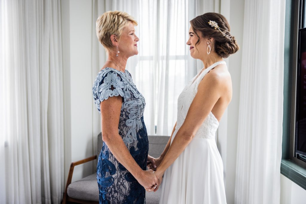 Bride and mom looking at each other