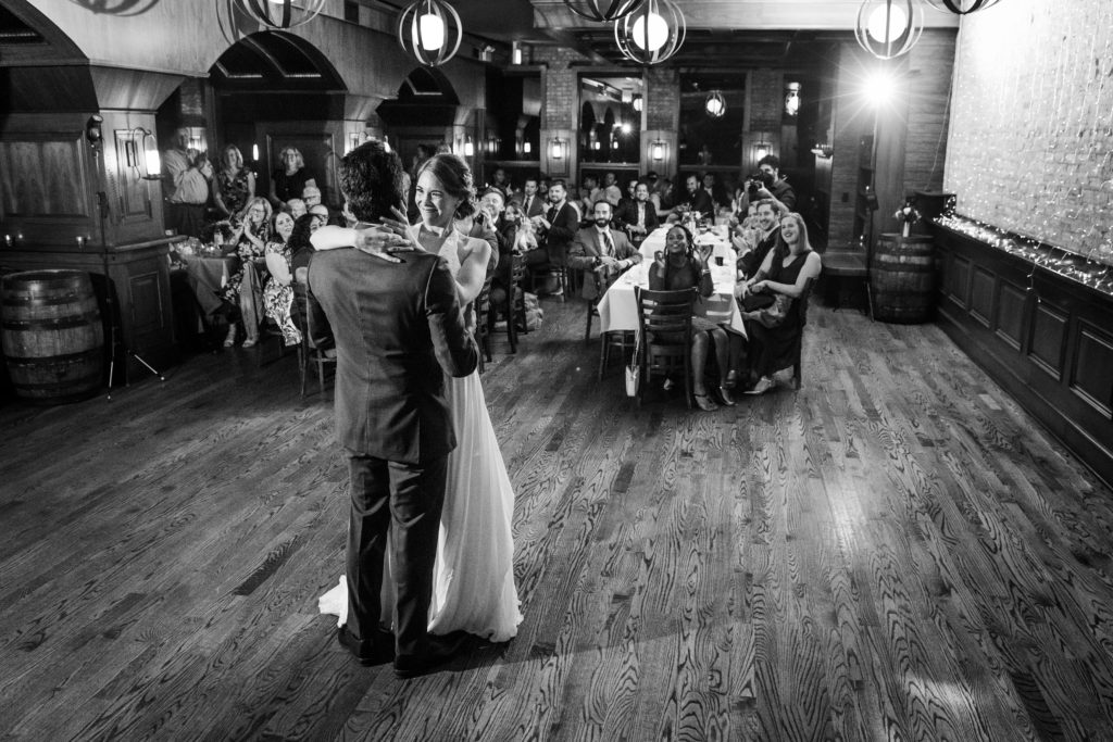 Couple kissing after their first dance