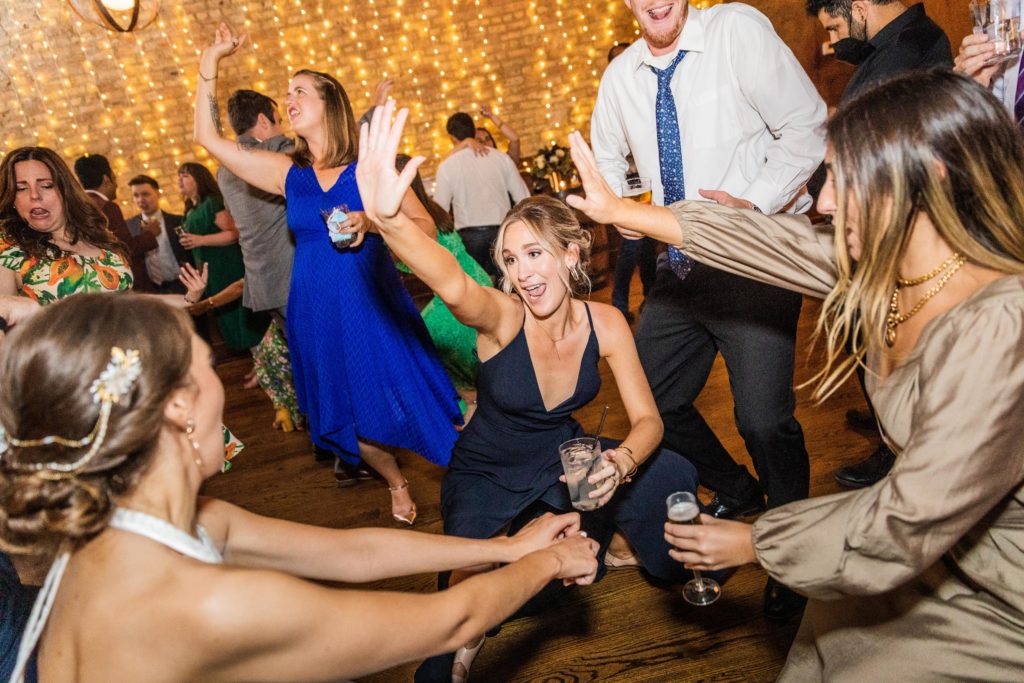 Bride's sister dropping low on the dance floor