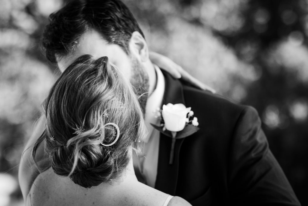 Bride kissing her husband in Lincoln Park