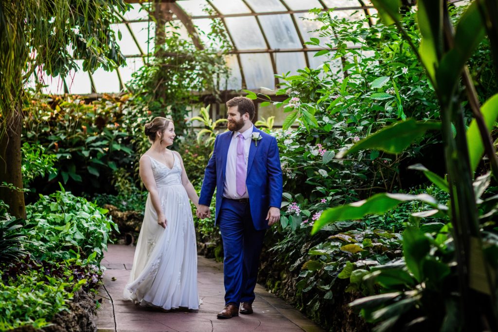 Bride and groom walking together before their Lincoln Park Conservatory Wedding