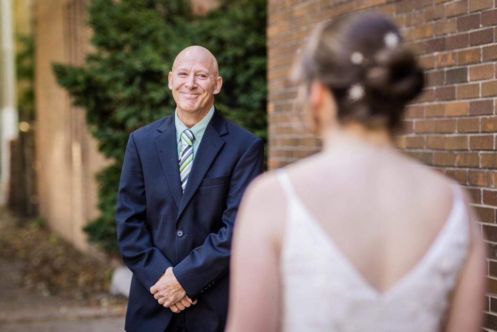 Father of the bride seeing his daughter for the first time