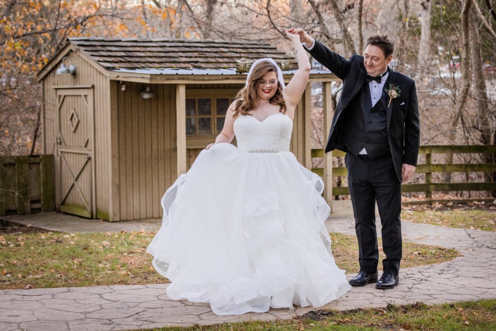 Groom twirls bride at Starved Rock