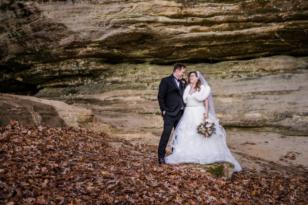 Bride and groom look at each other before their wedding at Starved Rock