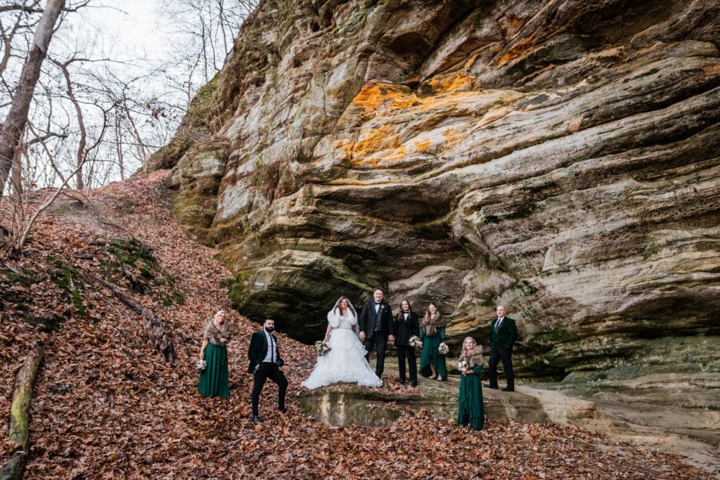 Wedding party poses while standing on different levels before the wedding at Starved Rock