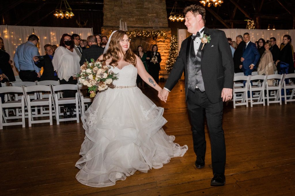Couple walk down the aisle after their wedding at Starved Rock