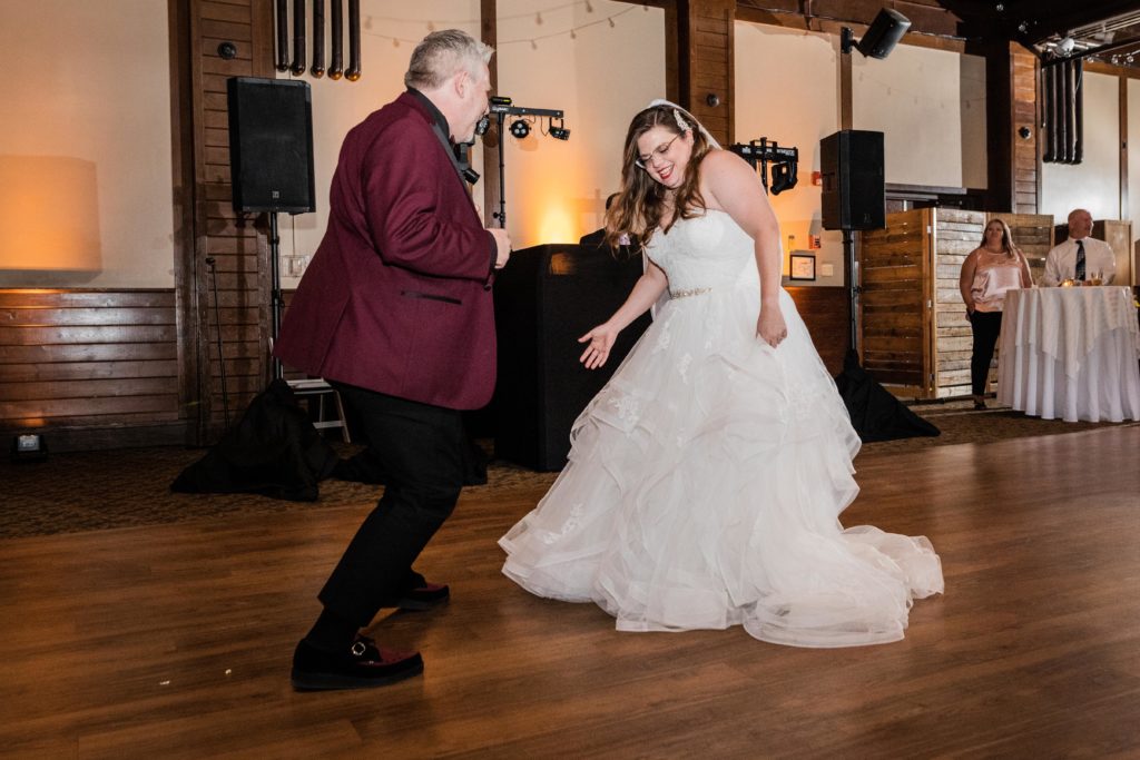 Bride dances with her stepfather 