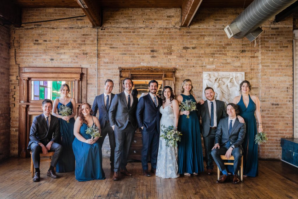 Wedding party poses at Salvage One