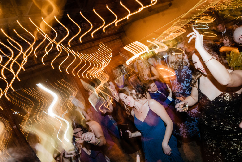 wedding guests dance on the dance floor at Ovation Chicago