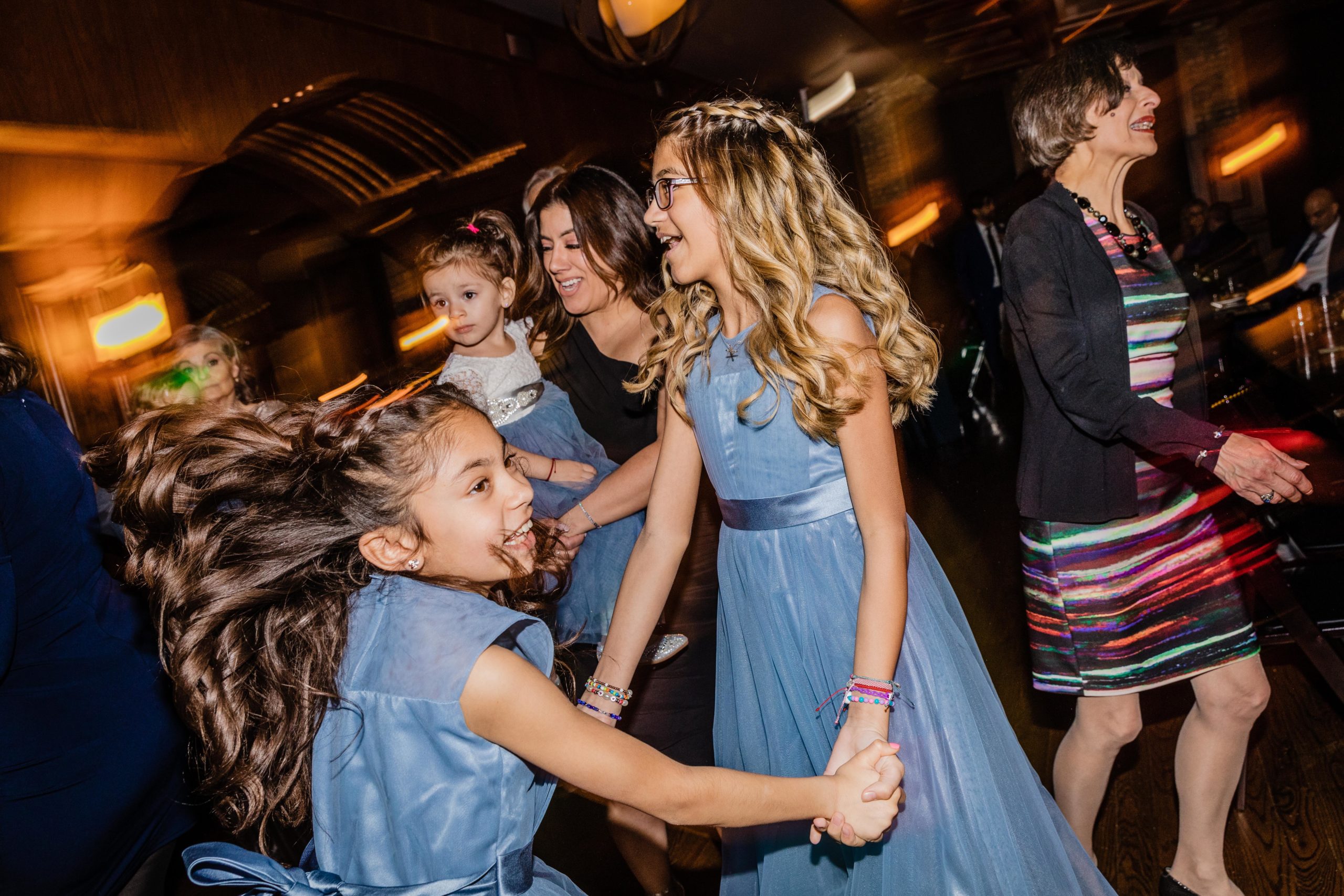 Junior bridesmaids dance at a Revolution Brewing Wedding