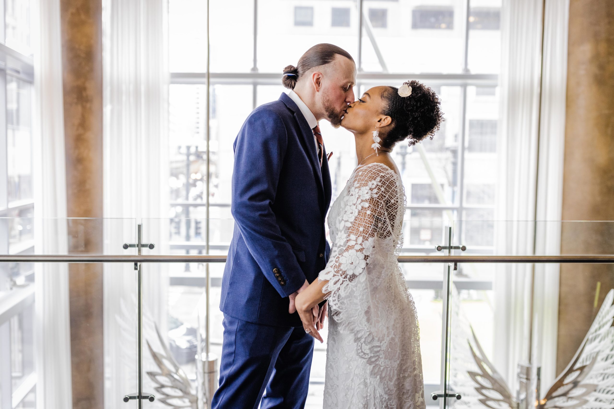 Bride and groom kissing at theWit Hotel Chicago