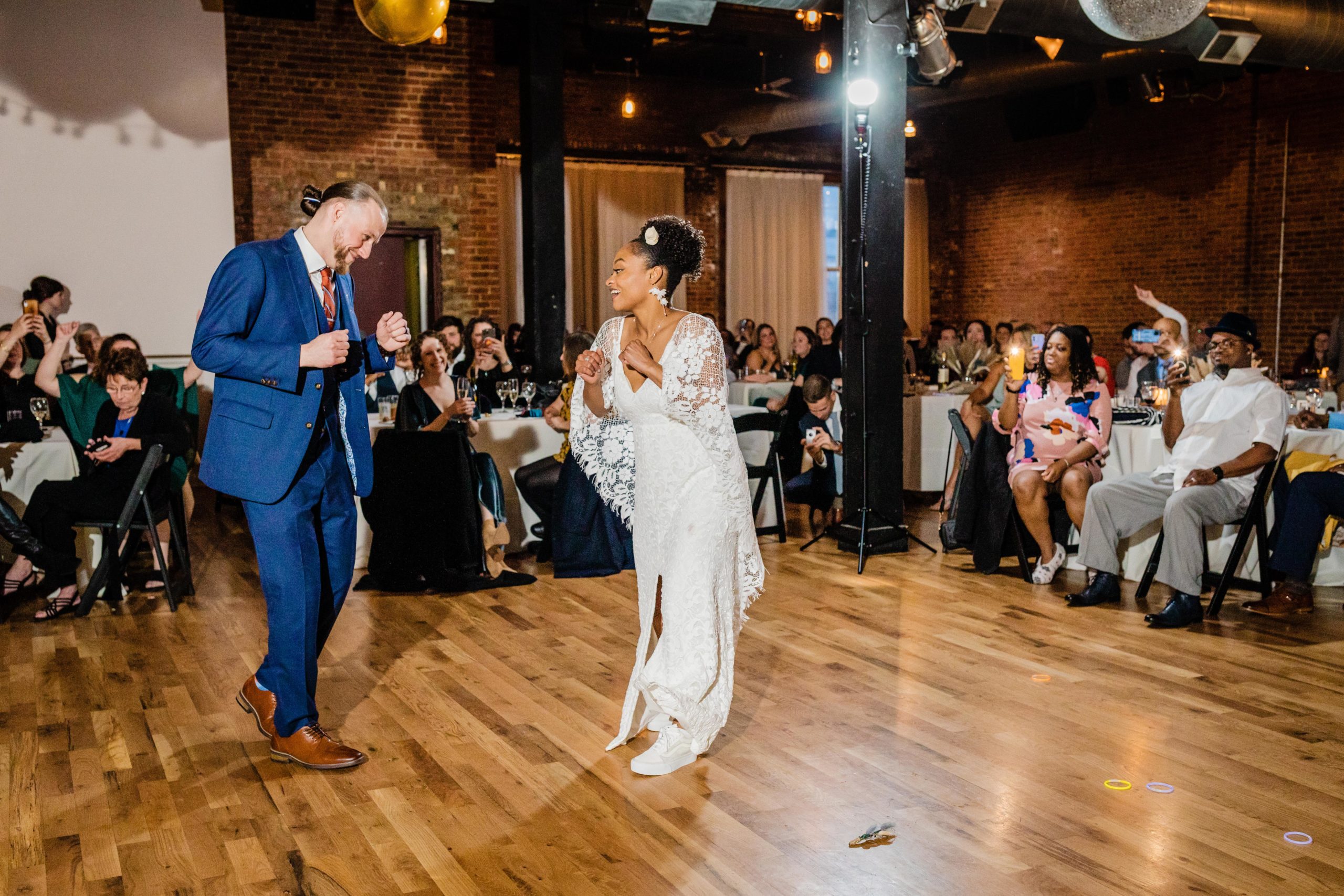 Bride and groom share a first dance at their Bottom Lounge Wedding