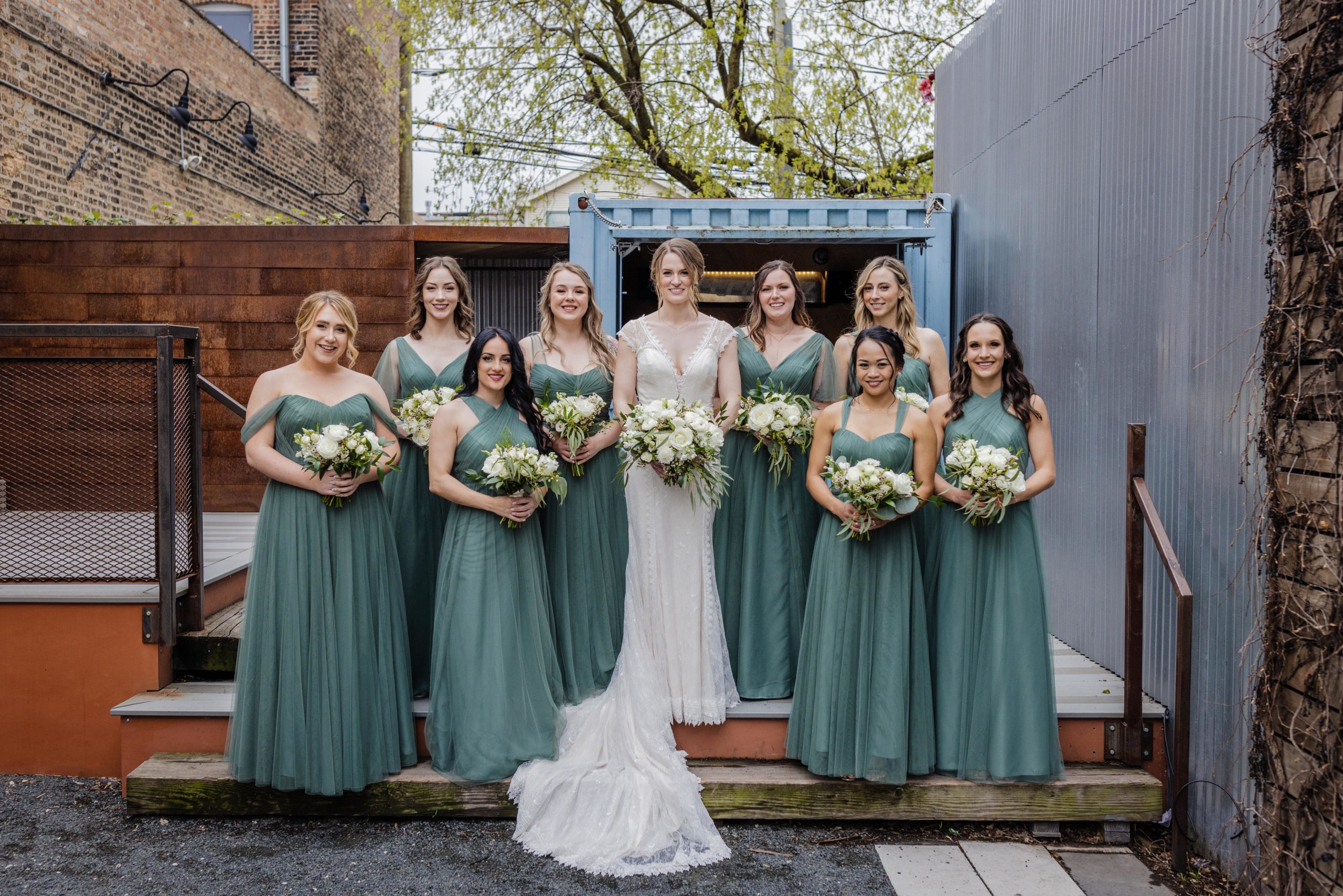Bridesmaids posing together at the joinery