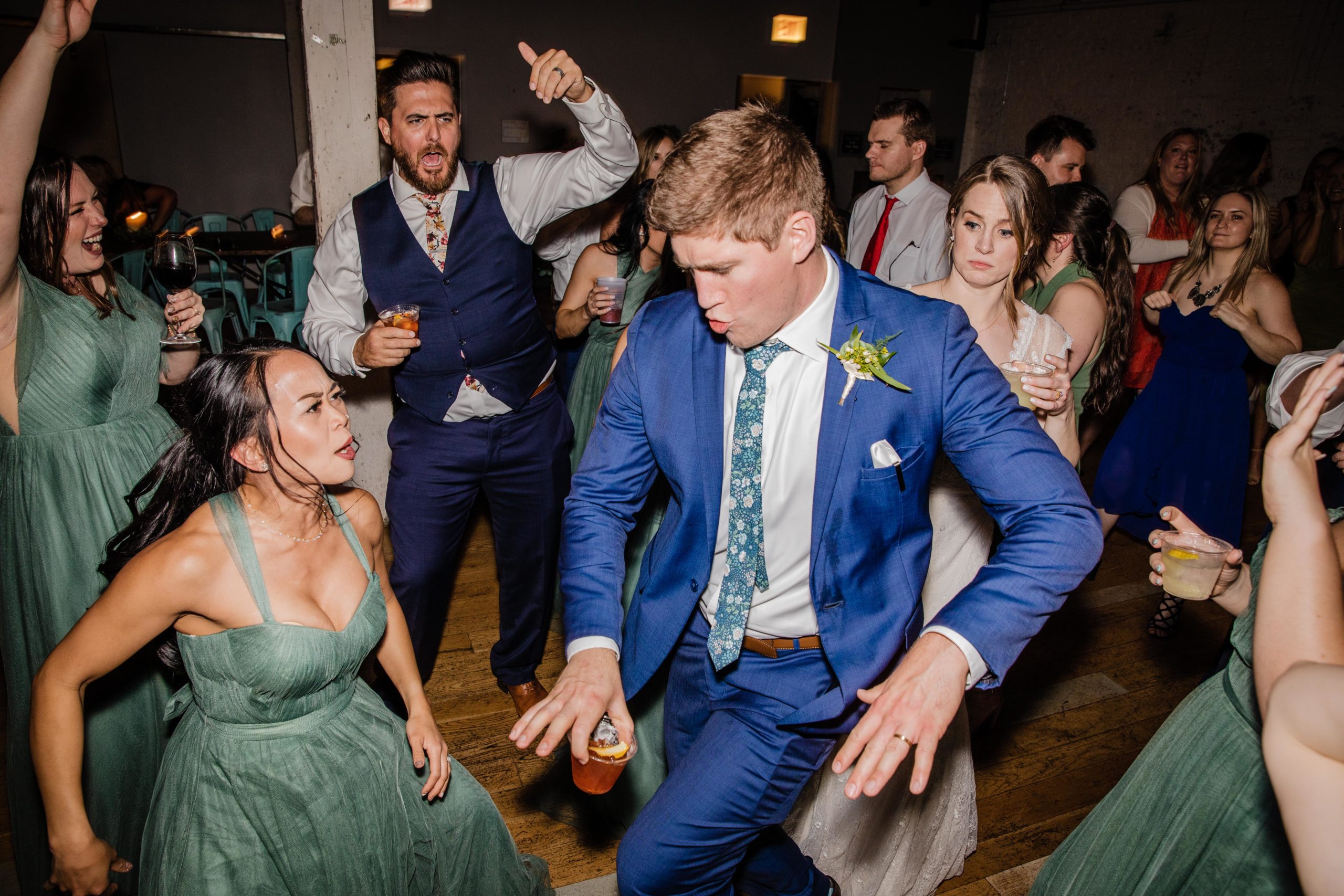 groom dancing on the dance floor