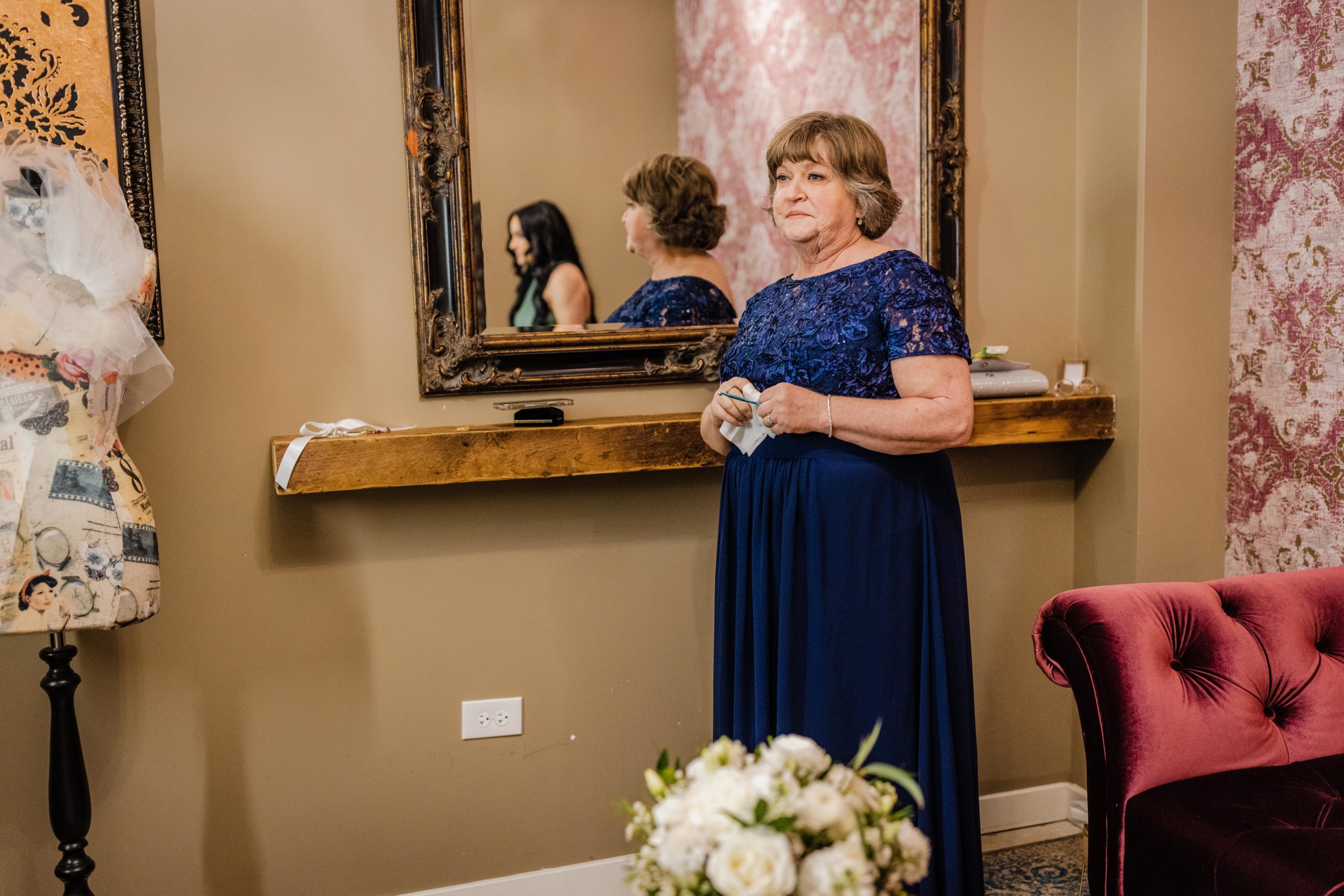 Mom watching the bride get ready at the joinery